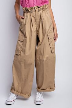 Step into a style that stands out with these OVERSIZED PAPERBAG UTILITY PANTS! With a paperbag waist, cuffed wide-legs, and oversized cargo pocket, you can sport a look that's unique and quirky with ease. Whether you're going out or staying in, these pants will always have you looking fresh! MODELHEIGHT 5'8"34" 24" 34" Olive Tan, Utility Pants, Pocket Model, Pants Large, Cargo Pocket, Wide Legs, Charcoal Color, Staying In, Roll Up