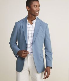 We've taken an iconic, warm-weather favorite, the seersucker blazer, and updated it with all the best features of our On-The-Go Collection. The weave is inherently lightweight and breathable, plus the performance stretch cotton blend wicks moisture for an effortlessly cool and comfortable fit and feel in all conditions. Unstructured Sport Coat For Business In Spring, Unstructured Sport Coat For Spring Business, Fitted Sport Coat For Business Casual In Summer, Fitted Business Casual Sport Coat For Summer, Summer Notch Lapel Sport Coat For Business Casual, Notch Lapel Sport Coat For Business Casual In Summer, Summer Business Casual Sport Coat With Notch Lapel, Spring Unstructured Cotton Sport Coat, Spring Cotton Sport Coat For Business Casual