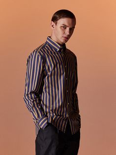 Editor's NotesThis versatile shirt is fitted with a neat button-down collar in a basic shirt profile. Tailored from soft-touch cotton, it's patterned with unique and refined color combination stripes.- Button-down collared neck- Button fastenings- Hi-low curved hem- Point logo label at the hem- Standard fit- Unisex wearMeasurements (in.) 1 / 2 / 3 / 4- Total Length: 28.3 in. / 29.5 in. / 30.3 in. / 31.5 in. - Shoulder: 18.1 in. / 18.9 in. / 19.5 in. / 20.1 in.- Chest: 41.3 in. / 43.3 in. / 44.9 Business Casual Button-up Shirt With Striped Collar, Business Casual Shirt With Striped Collar, Semi-formal Striped Shirt With Striped Collar, Semi-formal Striped Button-up Shirt, Classic Button-up Shirt With Contrast Stripes, Logo Label, Basic Shirts, Button Down Collar, Color Combination