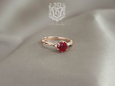 Nature inspired leaf and vine ring with a Ruby. This is an original engagement ring design from our nature inspired collection that correlates with our floral leaf vine theme only available at 3DHeraldry. The band imitates a twisted vine with leaves that meets and embraces the flower like center setting that securely holds the ruby. A subtle unique design with infinity twist that promises of forever love. Ring Features: * Center Stone: approx. 6mm Round Chatham Created Ruby. This is a lab grown Rose Gold Engagement Ring Simple, Ruby Ring Designs, Engagement Ring Floral, Ruby Engagement Ring Set, Ruby Ring Set, Original Engagement Rings, Vine Ring, Ruby And Diamond Ring, Floral Engagement Ring