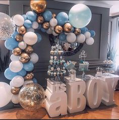 balloons and decorations in the shape of letters are on display