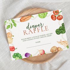 a paper raffle with vegetables on it sitting on top of a wooden platter