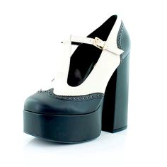 These Pumps Features A Textile And Synthetic Upper With Perforated Detail On The Vamp These Pumps Features A Round Platform Toe. These Pumps Have An Adjustable Ankle Strap With Buckle Closure. These Pumps Features Synthetic Lining And A Rubber Sole. These Pumps Features A 5.5" Block Heel And A 2" Platform. Retro White Block Heel Heels, Black And White Round Toe Heels For Party, Black And White Round Toe Heels, White Ankle Strap Heels With Leather Sole, Elegant Black And White Heels For Party, White High Heel With Heel Tab, White High Heels With Heel Tab, White Pointed Toe Heels With Heel Tab, Stinky Shoes