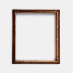 an old wooden frame hanging on the wall with a white background and clipping for text