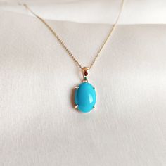 This stunning pendant is set in 14k Solid Yellow Gold with Natural Turquoise with utmost precision. It is an unique gemstone pendant for nearly every occasion and is completely hassle-free jewelry. ITEM DETAILS: * Gem: Turquoise * Gem Size: 10X14 mm * Gem Shape: Oval * Gem Weight: 5.86 carats * Gold Purity: 14KT * Gold Weight: 0.71 gram * Total Weight of the Pendant: 1.88 gram The Gold purity is guaranteed and it comes with authentic 14KT gold hallmark. Since my items are handmade, they are absolutely nickel and lead free. CUSTOMIZATION: * Gemstone customization is available and it can be substituted with a gem of your choice. Kindly message me for the same. PACKAGING * The Pendant comes with layers of safe and secure wrapping along with Free handmade jewelry box with every purchase. ➡️Hea Elegant Turquoise Necklace With Birthstone, Elegant Turquoise Birthstone Necklace, 14k Gold Turquoise Necklace For Gift, Handmade Jewelry Box, Arizona Turquoise, Bezel Pendant, Birthstone Pendant, Sleeping Beauty Turquoise, December Birthstone