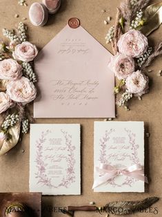 the wedding stationery is laid out and ready to be used