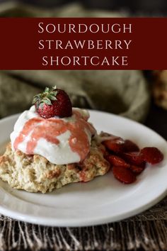 a white plate topped with strawberry shortcakes and whipped cream on top of oatmeal