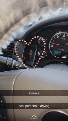 the dashboard of a car with an image of a person driving in front of it and text that reads, streakes best part about driving