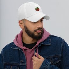 This Apple Fruit Dad Hat is expertly embroidered on a unisex, handmade dad cap. With an adjustable fit, this baseball gift cap is perfect for any apple lover. Enjoy the unique design and quality craftsmanship of this must-have accessory. Dad hats aren't just for dads. This one's got a low profile with an adjustable strap and curved visor. • 100% chino cotton twill • Green Camo color is 35% chino cotton twill, 65% polyester • Unstructured, 6-panel, low-profile • 6 embroidered eyelets • 3 ⅛” (7.6 Casual Baseball Cap With Flat Bill As Gift, Casual Flat Bill Baseball Cap As Gift, Casual Baseball Cap With Curved Bill, Curved Bill Baseball Cap With Embroidered Logo, Casual Curved Bill Baseball Cap, Casual Baseball Cap With Embroidered Logo As Gift, Cotton Dad Hat With Curved Bill As Gift, Cotton Trucker Hat With Curved Bill As Gift, Cotton Snapback Baseball Cap For Gift