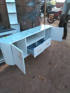 White tv stand Unique Tv Stand, Unique Tv Stands, Tv Stand White, Top Tv, Shutters, Tv Stand, Uganda, Tv, Glass