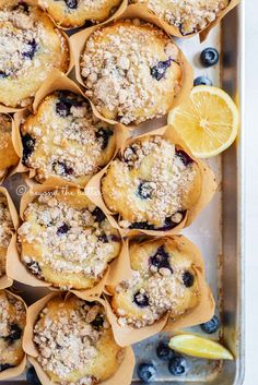 blueberry lemon muffins on a baking sheet