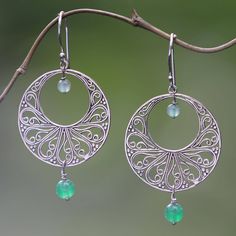 Balinese artisan Ketut Sulastri crafts these earrings in a unique circular design. The circular disk is created with an eye-catching design of sterling silver swirls that resemble fine lace. Two green quartz beads swing delightfully from the pair. Circular Design, Quartz Beads, Green Quartz, Ballroom Dance, Balinese, Ballroom, Jewelry Inspiration, Statement Earrings, Washer Necklace