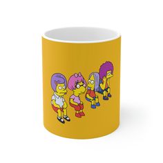 the simpsons family coffee mug in yellow with purple hair and pink wigs on it