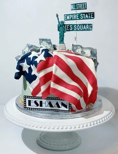 a cake decorated with american flags and street signs