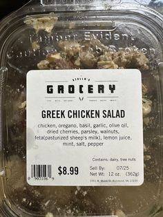 a close up of a plastic container with chicken salad in it's packaging label