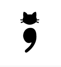 a black and white image of a cat's head with the letter q on it