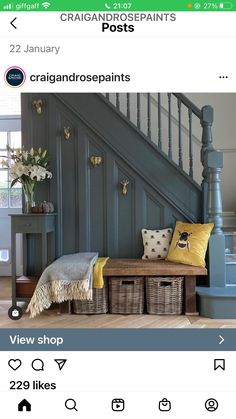 the stairs in this house are painted blue and have yellow pillows on top of them