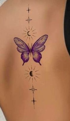 the back of a woman's stomach with a purple butterfly and stars on it