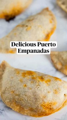 several empanadas sitting on top of a white plate with the words delicious puerto empanadas