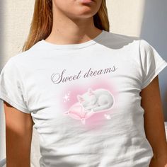 Goodnight to all of pretty sleeping angels ʚɞ ♡ More of Coquette Aesthetic: https://www.etsy.com/shop/RainieshopDesign?ref=seller-platform-mcnav&section_id=1  ♡  PRODUCT DETAILS  ♡  ♡ Gildan Women's Softstyle Tee ♡ 100% ringspun cotton ♡ Light fabric (4.5 oz/yd² (153 g/m ♡ Semi-fitted ♡ Tear-away label ♡ Runs true to size  ♡  SIZING  ♡  ▸For a fitted look, you can choose your usual size or size down for a slim fit look. If you prefer a more relaxed or oversized style, it's recommended to select Pink Coquette Shirts, Y2k Cat Print Crew Neck T-shirt, Preppy Baby, Kawaii Hoodie, Kawaii Pink Cat Design T-shirt, Cute Pink Cat Print T-shirt, White Kawaii T-shirt With Cat Print, Heart Hoodie, Dream's Cat