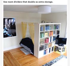 a bedroom with bookshelf, bed and desk in it's corner area