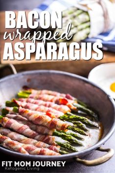 bacon wrapped asparagus in a pan on a table