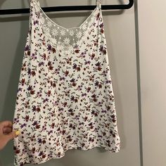 American Eagle Tank Never Worn, Pretty Flower Design With Lace On The Front. Size Xsmall With Tags White Floral Print Cami Tank Top, Casual White Top With Ditsy Floral Print, Casual White Tops With Ditsy Floral Print, Cute White Tank Top With Floral Print, White V-neck Tank Top With Floral Print, White Floral Print V-neck Tank Top, Cute Floral Print Cotton Tank Top, White Tops With Plant Print For Vacation, Cute Floral Print Cami Top