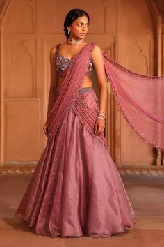 Wine pre-draped attached cancan lehenga saree with shimmer finish detail and sequin, beads, glass beads, and crystals embroidery. Paired with a padded corset blouse with sequin, cutdana work. - Aza Fashions Embellished Draped Sharara For Reception, Festive Draped Embellished Gown, Embellished Draped Bollywood Lehenga, Bollywood Embellished Draped Lehenga, Bollywood Style Draped Embellished Lehenga, Festive Embellished Draped Lehenga, Draped Semi-stitched Lehenga With Sheer Dupatta, Traditional Drape Embellished Gown For Diwali, Traditional Drape Art Silk Embellished Dress