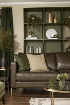 Experiment with this precise design and furniture in your own area using AI HomeDesign with just one simple click!Brown, Leather, Couch, Living room, Green, Earth tone, Color scheme, Tones, Palette, Dark, Golden, Charms, Olive, Venetian, Pine#LivingRoom #GreenWall #EarthTones #ColorPalette #DarkGreen #InteriorDesign #NaturalColors #OliveGreen #VenetianRed #AIHomeDesign Sofa Room Ideas, Green Couch Decor, Dark Brown Living Room, Brown Couch Decor, Green Study, Brown Leather Couch Living Room