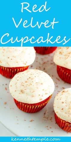 red velvet cupcakes with white frosting and sprinkles on top