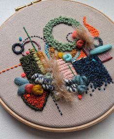 a close up of a embroidery on a hoop