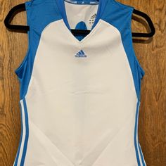 New With Tags, Blue Adidas Comp Tank With Matching Skirt With No Tags, Both Are A Size Medium. Adidas Blue Sleeveless Top, Adidas Pharrell Williams, Adidas Tank Top, Crewneck Sweatshirt Women, Adidas Zip Up, Adidas Tee, Yellow Sweatshirt, Adidas Trefoil, Adidas Golf