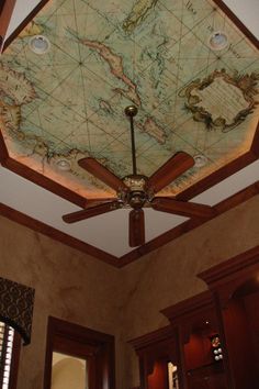 a ceiling with a map on it in a room