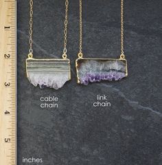 Amethyst Stalactite with druzy crystal formations, edged in gold n a custom length Gold Filled chain in two chain designs:  cable or link chain. Due to the raw nature of this stone, each pendant varies in color & size, select a pendant you like. Each pendant is unique and gorgeous just like YOU! Amethyst is the stone of spirituality and assist  in calming the mind, allowing restful sleep and reducing stress. Your necklace will arrive with a descriptive hang tag, wrapped in  tissues paper and Luxury Amethyst Crystal Necklaces For Gifts, Amethyst Properties, Amethyst Stalactite, Necklace Amethyst, Crystal Formations, Gold N, Raw Crystal Necklace, Druzy Necklace, Druzy Crystal