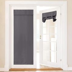 an open door with a black curtain on it