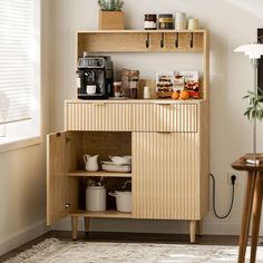 PRICES MAY VARY. Modern Sideboard Buffet Cabinet: This sleek sideboard, adorned with a wavy finish, exudes elegance with its wooden grain veneer and elegant lines. Its multifunctional design offers ample storage space, elevating both the functionality and aesthetics of your dining or kitchen area. Adjustable shelves and a generous surface area contribute to its versatility. Ample Storage: Boasting spacious top shelves and built-in outlets, this storage cabinet is perfect for housing coffee makers and cups. Featuring a sturdy wavy cabinet body and drawers, it offers ample storage capacity that's both practical and visually appealing. Ideal as a dining buffet or coffee bar, it helps maintain a tidy and organized look in your dining room or kitchen. Dimensions: 31.5"W x 15.7"D x 47.2"H. Coffe Contemporary Industrial Mini Coffee Cabinet Cart Luxury 36" Wide, Coffee Station Cabinet Minimalist, Kitchen Shelf Cart, Kitchen Shelf Coffee Machine, Contemporary Industrial Mini Coffee Cabinet, Counter Top Storage Unit, Bar Buffet Cabinet Mid Century, Dresser Alternative Storage Kitchen, Free Standing Shelf For Kitchen