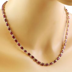 Stamped: 14K Total Necklace Weight: 25.4 GramsLength: 17 Inches Ruby Weight: 31.81 Carat (6.00x4.00 Millimeter)Diamond Weight: 1.50 Carat (F-G Color, VS2-SI1 Clarity Face Measures: 6.00 Millimeter SKU: [600022] Formal White Gold Tennis Necklace With Gemstone, Formal Gemstone Tennis Necklace, Elegant Round Gemstone Tennis Necklace, Elegant Gemstone Tennis Necklace, Classic Ruby Necklace In Yellow Gold, Classic Yellow Gold Ruby Necklace, Classic Ruby Necklaces For Formal Occasions, Fine Jewelry Yellow Gold Necklace Aaa Quality, Classic Gemstone Tennis Necklace - Gift