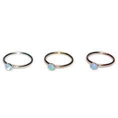 This is a very beautiful sterling silver opal nose ring. This modern and stylish piece of jewelry can add value to any outfit. It can be used for earlobe, cartilage, helix and tragus piercing as well. * The listing is for 1 (one) hoop. * Wire ends were rounded and polished to provide you with a smooth end for insertion. The earring was then polished. * Available inner diameters in millimeters (widths) for your ring: 7mm, 8mm, 9mm, 10mm * You can choose among variety of gemstones for this item. P Hypoallergenic Round Opal Jewelry, Minimalist Round Ring, Sterling Silver Birthstone Piercings, Dainty Hypoallergenic Round Nose Rings, Hypoallergenic Dainty Round Nose Rings, Dainty Internally Threaded Nose Rings, Dainty Internally Threaded Hoop Rings, Stackable Round Cartilage Earrings For Gifts, Stackable Round Cartilage Earrings As Gift