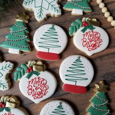 decorated christmas cookies on a wooden table