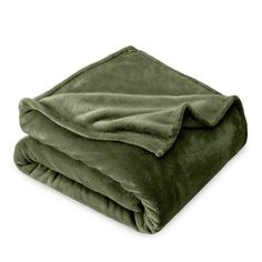 a green blanket folded on top of each other