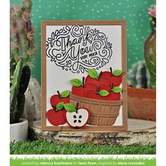 a card with an apple basket on it