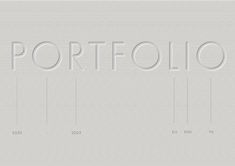 the word portfolio is made up of white letters on a light gray background