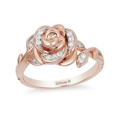 a rose ring with diamonds on it