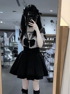 This black skirt features an elastic waistband with lace trim and a cross pattern. It has a multi-layered skirt design.  The price includes only one skirt.   	 		 			Size 			M 			L 			XL 		 		 			Length 			62-70 			70-78 			78-86 		 		 			Waist 			42 			43.5 			45 Black Mini Dress With Ruffled Skirt, Harajuku Style Black Mini Bottoms, Black Harajuku Mini Bottoms, Black Harajuku Style Mini Bottoms, Black Fitted Two-piece Look Skirt, Black Fitted Skirt With Fake Two-piece Detail, Fitted Black Skirt With Fake Two-piece Detail, Black Harajuku Style Summer Skirt, Gothic Skirt With Lace Trim