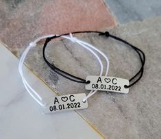 Custom Bracelets for Couples, Engraved with Initials and Date, Matching Couples Bracelets Set, Boyfriend Husband Couples Gift, His and Hers Meaningful set of two engraved bracelets, personalized with initials and a special date. The bracelet close using simple sliding knots. The aluminum bar measures approximately 23-25 mm. Please write the initials and the date you would like, in the Personalization box. Aluminum is a dark silver metal that appears shiny like silver when is hit by light. The br Adjustable White Jewelry With Engraving Option, Adjustable Engraved White Bracelets, Adjustable Bracelets With Engraving Option For Friendship, White Adjustable Engraved Bracelets, White Engraved Adjustable Bracelet, Matching Couples Bracelets, Bracelets For Couples, Couples Bracelets, Send Package