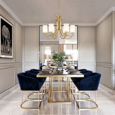 a dining room table with blue chairs and a chandelier