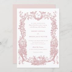 a pink and white wedding card with an ornate frame on the front, surrounded by flowers