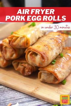 an egg roll on a cutting board with text overlay that reads air fryer egg rolls