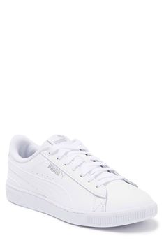 Add a fresh element to your footwear collection with this lightweight leather sneaker. Lace-up closure Cushioned insole Round toe with bumper White sole Leather upper/rubber sole Imported Athleisure Puma Sneakers With Synthetic Material, White Sole Lace-up Puma Sneakers, Mid-top Synthetic Puma Sneakers, Low-top Synthetic Sneakers With Puma Logo, Low-top Synthetic Puma Sneakers, Puma Logo Sneakers With Round Toe, Low-top Puma Sneakers With White Sole, Spring Low-top Puma Sneakers, Puma Sneakers With White Sole And Round Toe