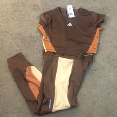 Brand New Adidas Tech Fit Active Wear Women’s Sz M. Check Picture For Details The Item In The Picture Is Exactly What You Would Be Purchasing.. Sporty Fitted Adidas Sets, Fitted Brown Athleisure Top, Active Wear Women, Adidas Brown, Adidas Tech, White Tracksuit, Adidas Sweats, White Windbreaker, Track Pants Women